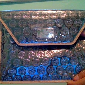 Beautiful Michael kors clutch silver with gold
